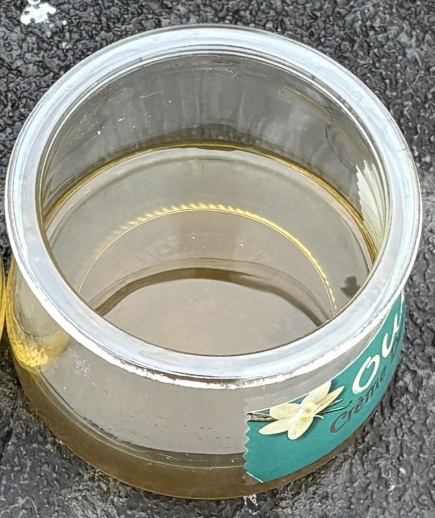 Semi-clear glycol after 10-micron filtration